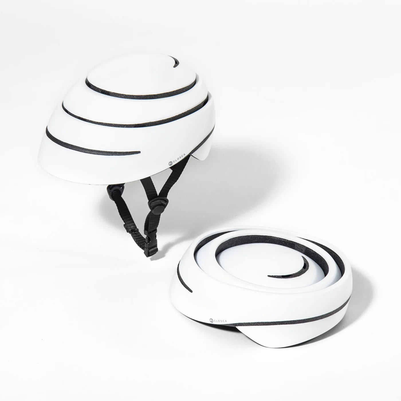 Casque Closca Loop blanc combinant design moderne et protection pour la mobilité urbaine.